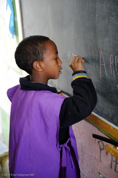 20120327_102246 Nikon D3S (1) 2x3.jpg - Trying his hand at the blackboard